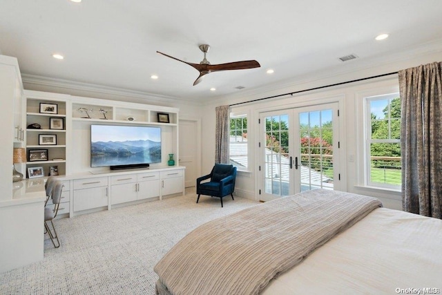 carpeted bedroom with ceiling fan, ornamental molding, access to outside, and french doors