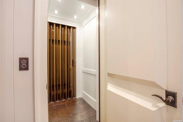 bathroom featuring tile patterned floors and elevator