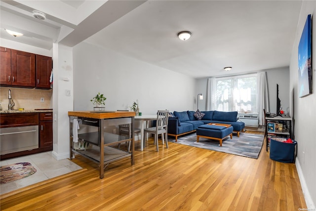 living room with light hardwood / wood-style flooring