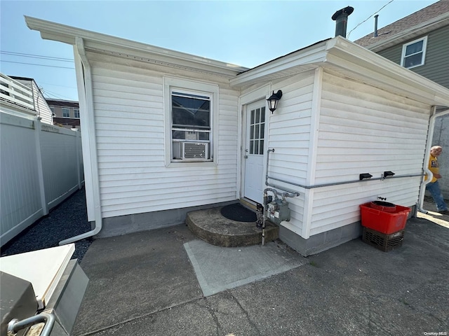 entrance to property with a patio area