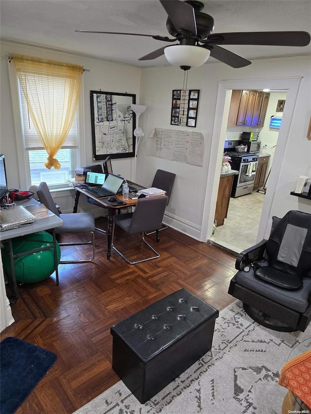 living room with dark parquet floors and ceiling fan