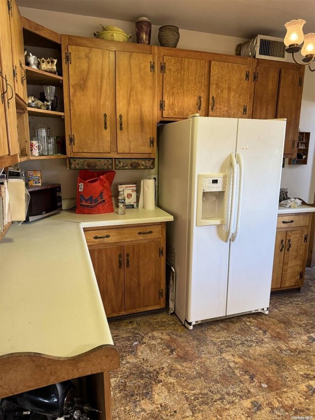 329 Forest Rd, Little Neck, NY 11363 - kitchen featuring white refrigerator with ice dispenser, black microwave, light countertops, and brown cabinetry