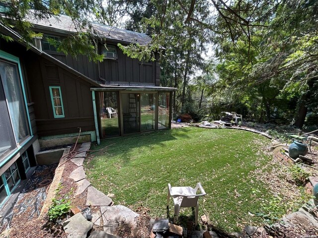 329 Forest Rd, Little Neck, NY 11363 - view of green lawn with a sunroom