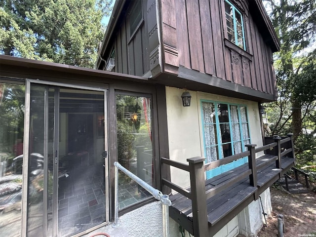 exterior space featuring a sunroom