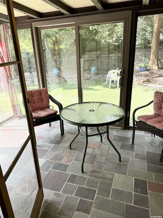 sunroom / solarium with a healthy amount of sunlight