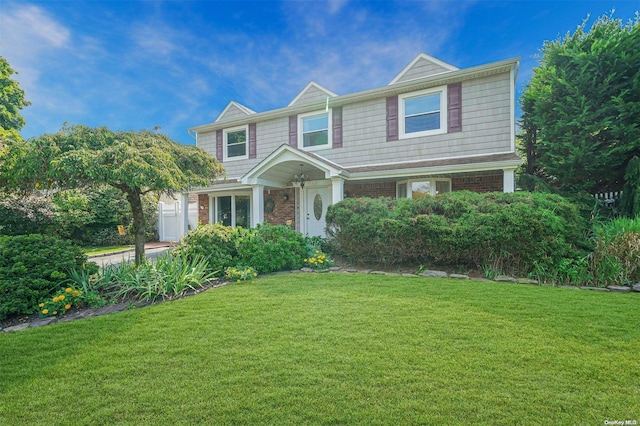 view of front facade with a front lawn