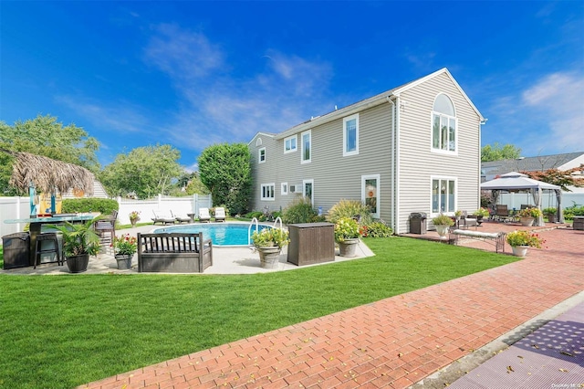 view of pool featuring a gazebo, a patio, and a lawn