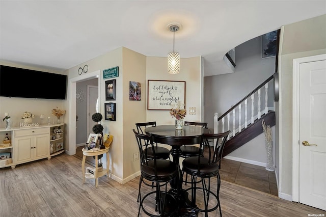 dining room featuring light wood-type flooring