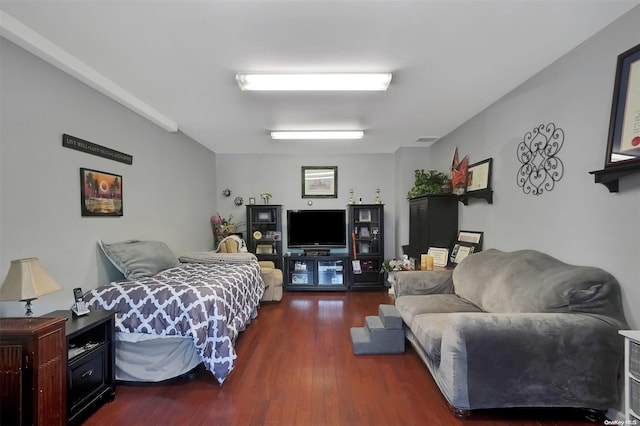 bedroom featuring dark wood-type flooring