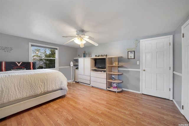 bedroom with ceiling fan and light wood-type flooring