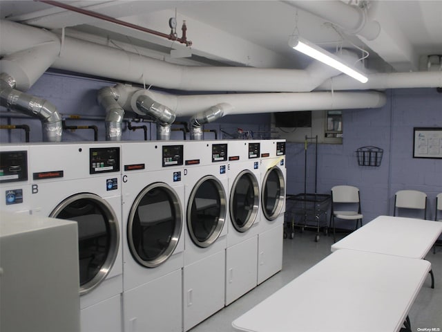 laundry room featuring separate washer and dryer