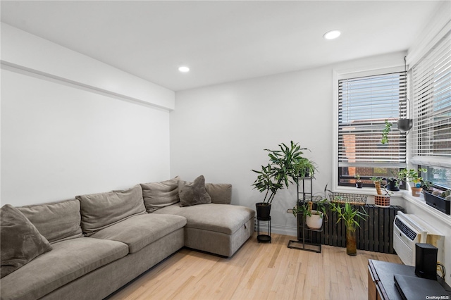 living room with light hardwood / wood-style floors