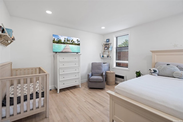 bedroom featuring light wood-type flooring