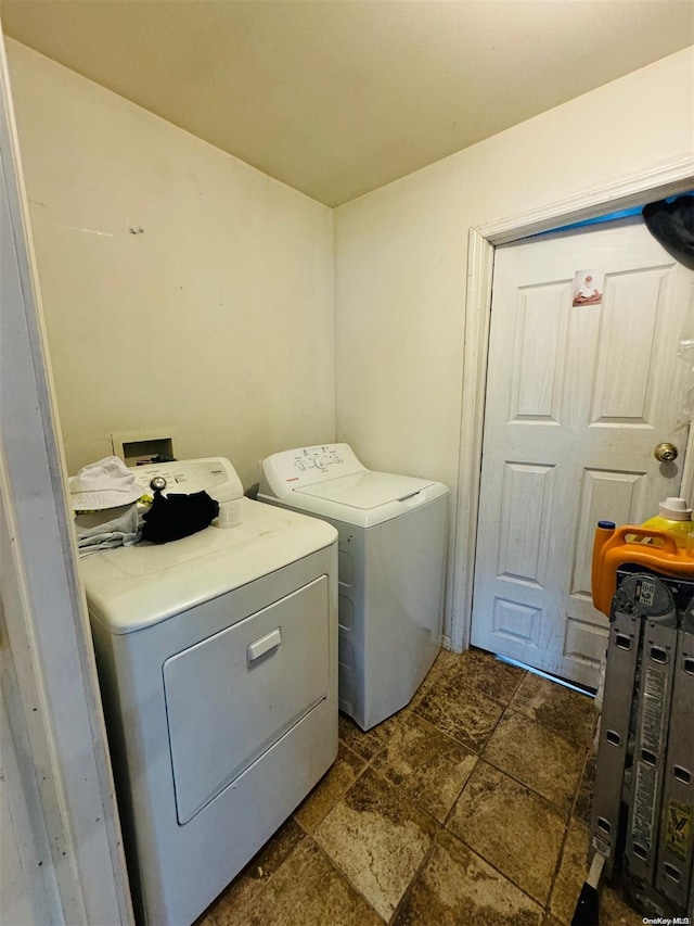 washroom featuring separate washer and dryer