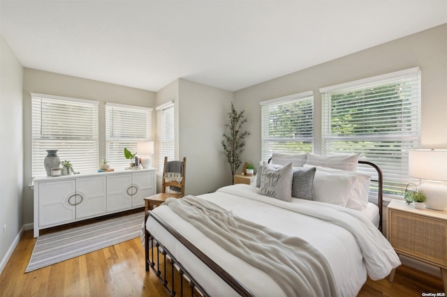 bedroom with light wood-type flooring