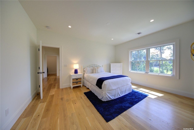 bedroom featuring light hardwood / wood-style floors