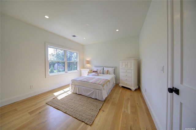 bedroom with light wood-type flooring