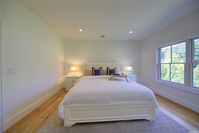 bedroom featuring light hardwood / wood-style floors