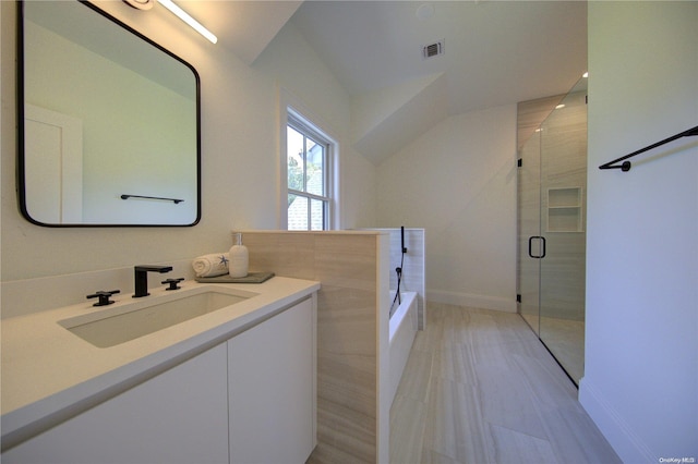 151 Newtown Ln, East Hampton, NY 11937 - full bath with vanity, a garden tub, a stall shower, lofted ceiling, and baseboards