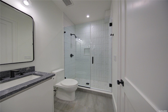 151 Newtown Ln, East Hampton, NY 11937 - bathroom featuring toilet, a stall shower, vanity, and recessed lighting
