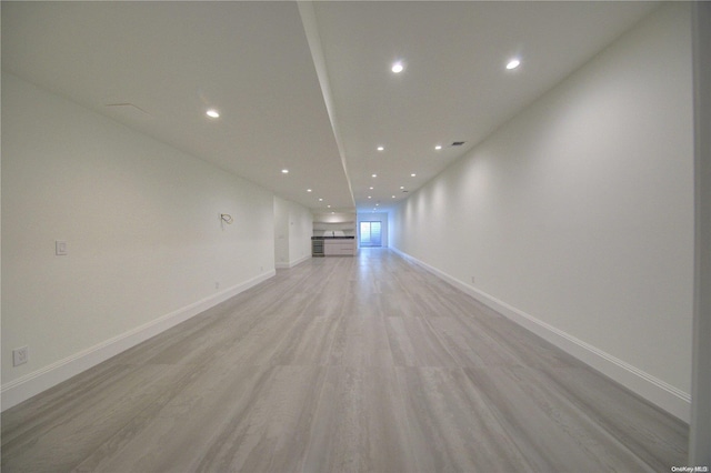 unfurnished living room featuring light hardwood / wood-style floors