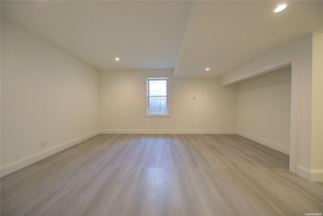 151 Newtown Ln, East Hampton, NY 11937 - below grade area with light wood finished floors, recessed lighting, and baseboards