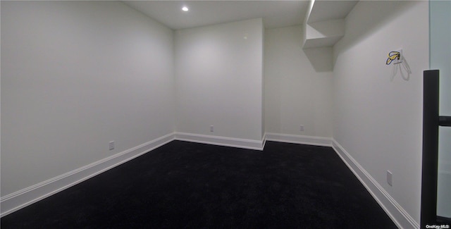 151 Newtown Ln, East Hampton, NY 11937 - empty room featuring dark carpet, baseboards, and recessed lighting