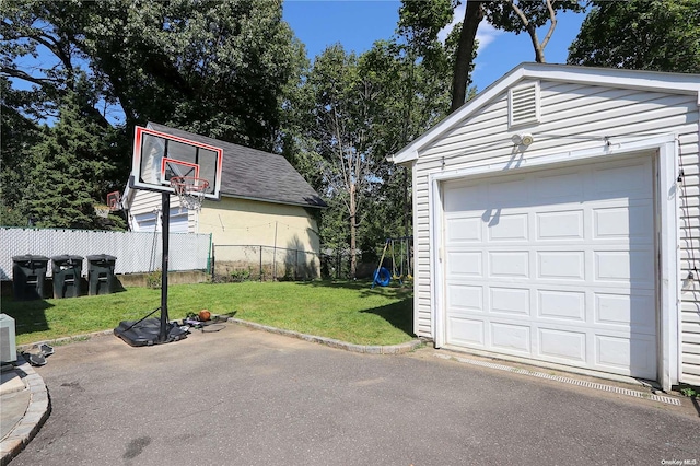 garage with a yard