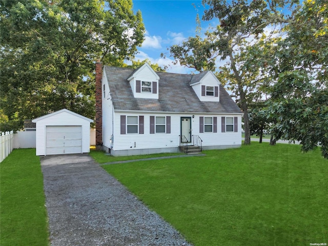 cape cod home with an outbuilding, a front lawn, and a garage