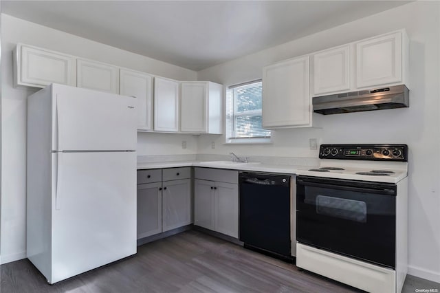 kitchen featuring white cabinets, dark hardwood / wood-style floors, white appliances, and range hood