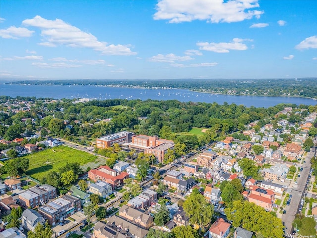 drone / aerial view with a water view