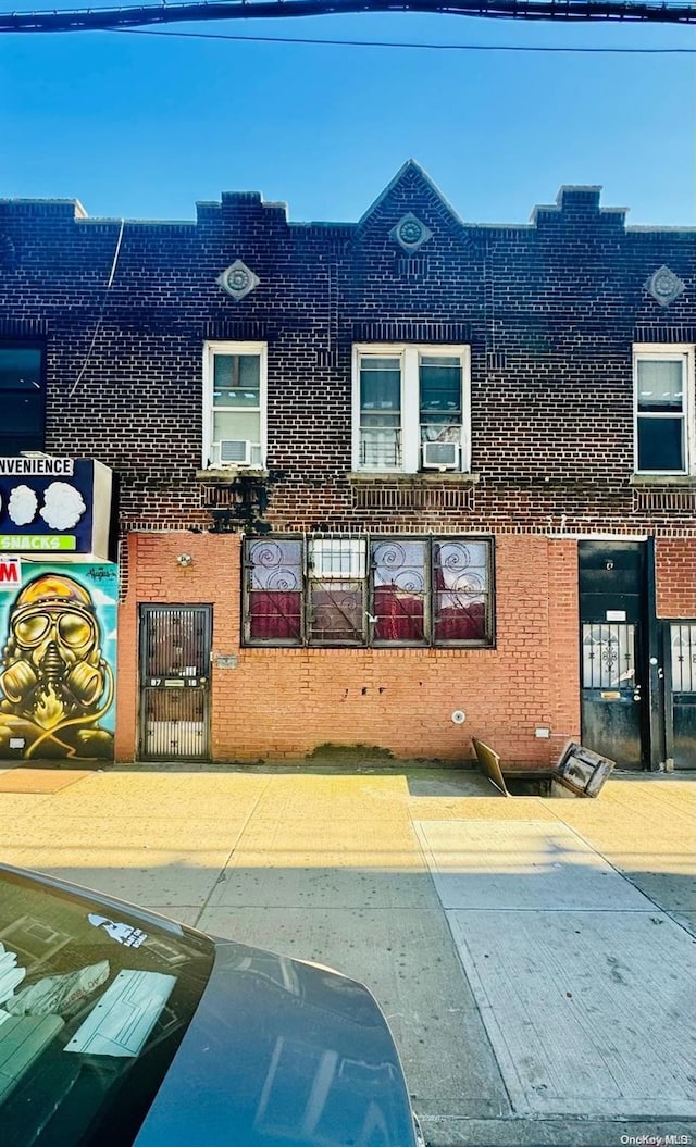 view of front of property with cooling unit