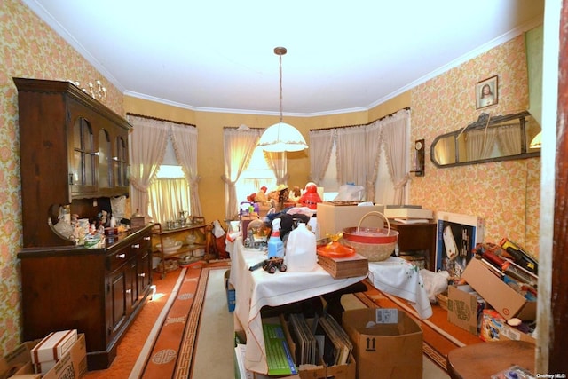 dining space featuring crown molding