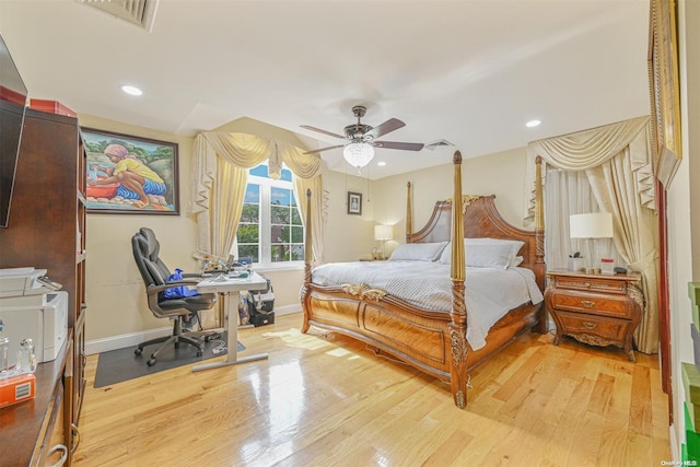 bedroom with ceiling fan and light wood-type flooring