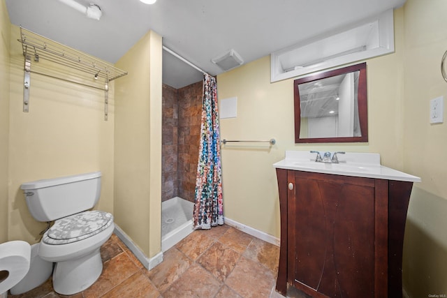 bathroom with visible vents, a stall shower, toilet, and baseboards