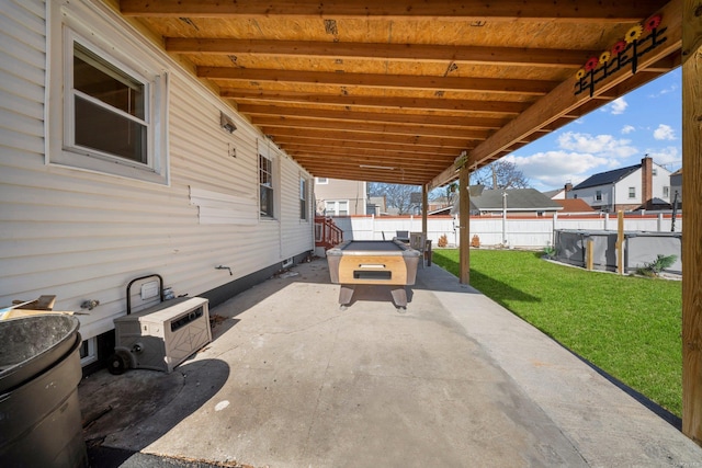 view of patio featuring a fenced backyard and a pool