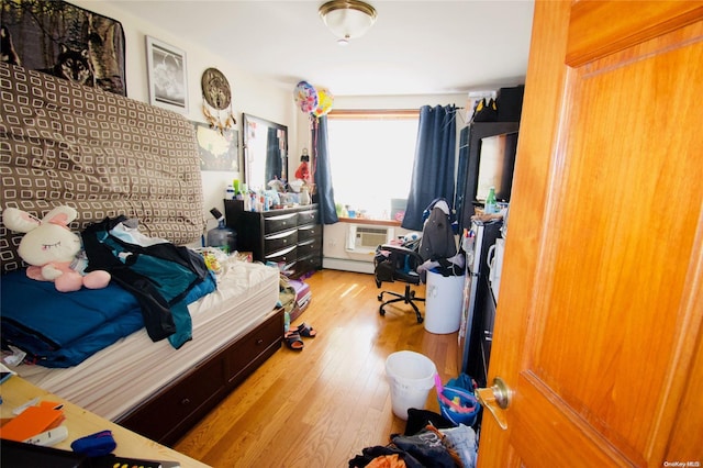 bedroom featuring light hardwood / wood-style floors