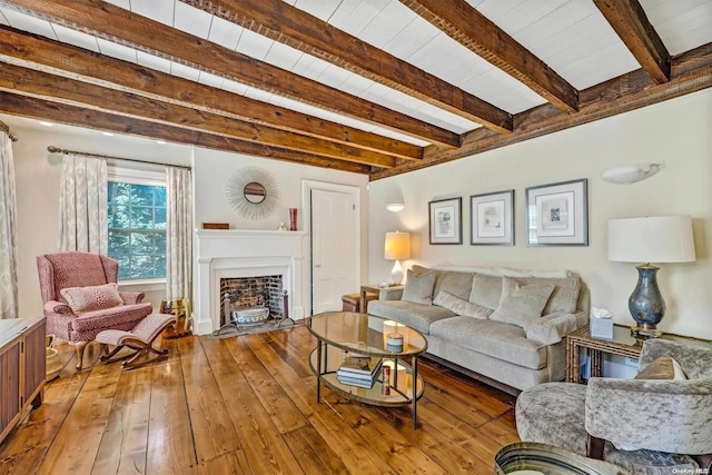 15405 Main Rd, Mattituck, NY 11952 - living room featuring hardwood / wood-style floors, a fireplace with flush hearth, and wood ceiling with exposed beams