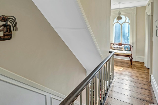 stairway featuring hardwood / wood-style floors