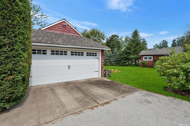 garage with a lawn