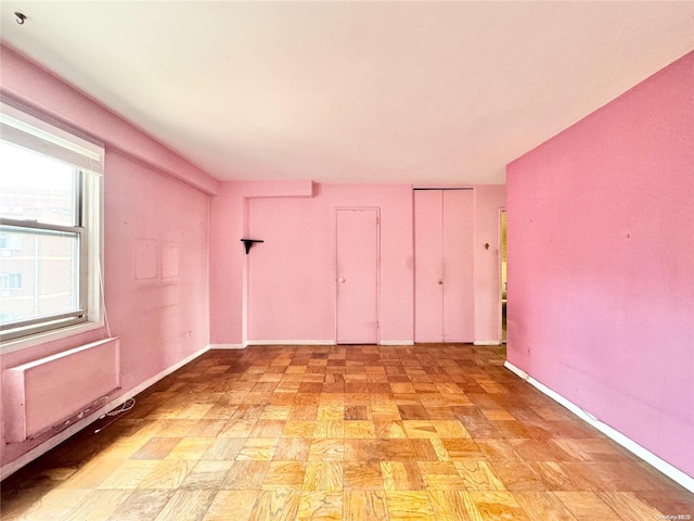 empty room featuring light parquet floors