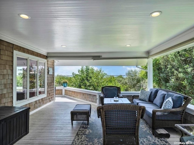 deck with an outdoor hangout area