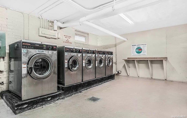 laundry room featuring washing machine and dryer