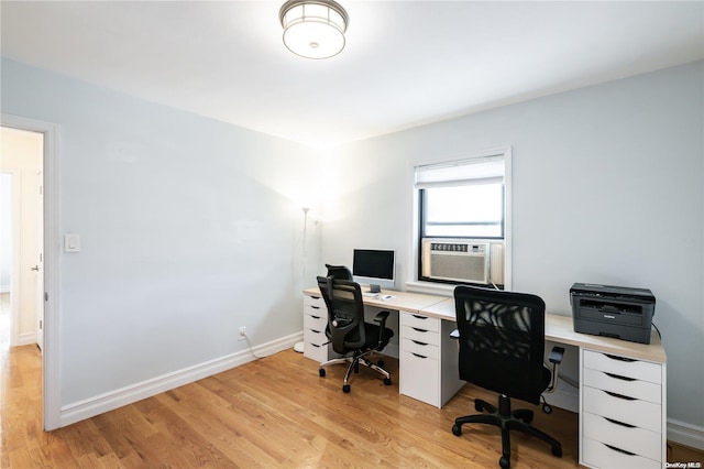 office featuring light hardwood / wood-style floors and cooling unit