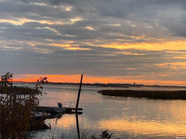 property view of water featuring a dock