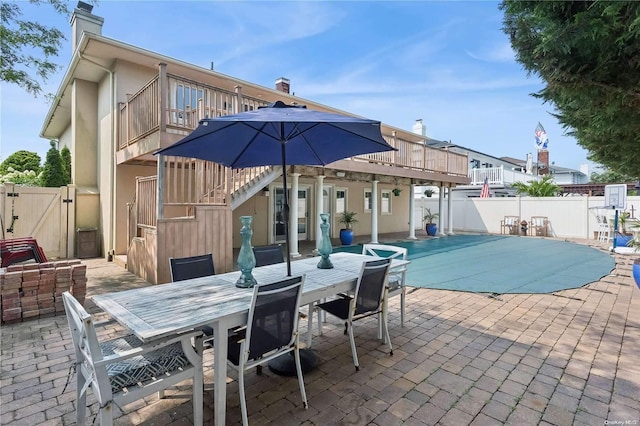 view of pool featuring a patio