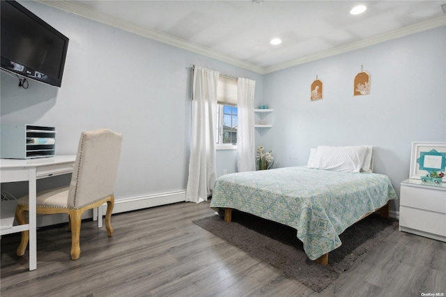 bedroom with hardwood / wood-style flooring and ornamental molding