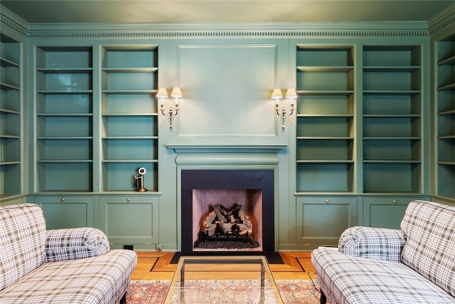 living room featuring built in features and light wood-type flooring