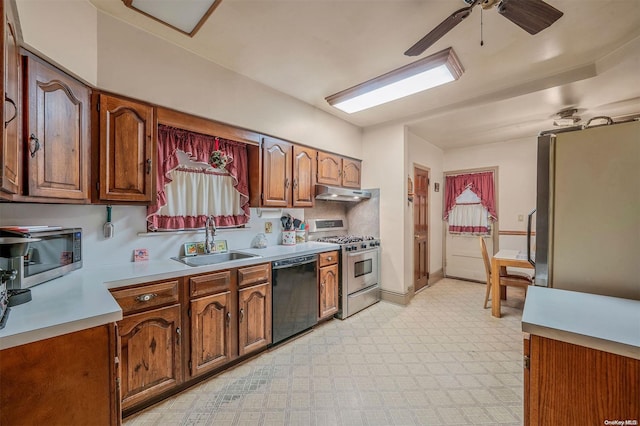 kitchen featuring ceiling fan, sink, and appliances with stainless steel finishes