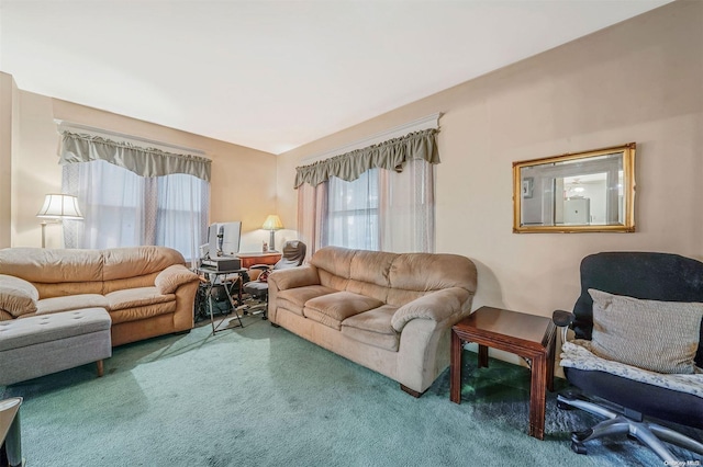 living room with carpet floors and plenty of natural light